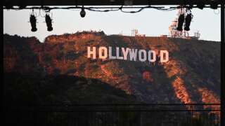 The Hollywood sign is seen from Hollywood Boulevard, on the site of the upcoming Academy Award ceremony on February 21, 2019 in Hollywood. - The annual Academy Awards ceremony will take place on February 24, 2019. (Photo by Robyn Beck / AFP)