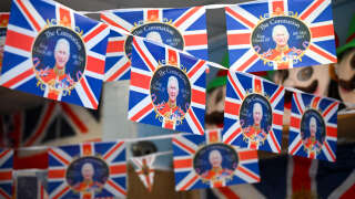 WEYMOUTH, ENGLAND - APRIL 19: King Charles III coronation bunting is displayed at Weymouth Gifts & Fancy Dress shop, on April 19, 2023 in Weymouth, England. The Coronation of King Charles III and The Queen Consort will take place on May 6, part of a three-day celebration. (Photo by Finnbarr Webster/Getty Images)