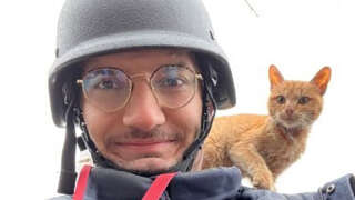AFP journalist Arman Soldin snaps a selfie with a cat on his shoulder during an assignment for AFP in Ukraine. Arman was killed by a rocket strike as he reported with AFP colleagues from Ukrainian positions in Chasiv Yar on May 9, 2023. Arman, who was 32 and born in Bosnia, began his career as an AFP intern in the Rome bureau before moving to London in 2015. He was formally appointed as Ukraine video coordinator for AFP based in Kyiv in September 2022. Arman's death is a terrible reminder of the risks and dangers of covering this war. Our thoughts tonight are with his family and friends, and with all AFP people on the ground in Ukraine. (Photo by Arman SOLDIN / AFP)