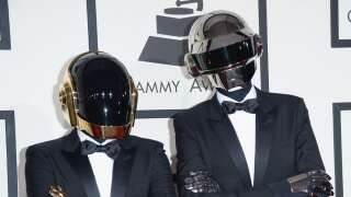 LOS ANGELES, CA - JANUARY 26: Guy-Manuel de Homem-Christo (L) and Thomas Bangalter of Daft Punk attend the 56th GRAMMY Awards at Staples Center on January 26, 2014 in Los Angeles, California.   Jason Merritt/Getty Images/AFP (Photo by Jason Merritt / GETTY IMAGES NORTH AMERICA / Getty Images via AFP)