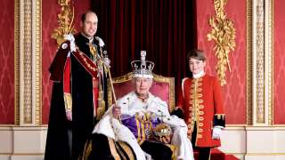 A handout picture released by Buckingham Palace on May 12, 2023 shows Britain's King Charles III (C), Britain's Prince William (L), Prince of Wales, and Britain's Prince George of Wales (R), posing in the Throne Room of Buckingham Palace in London. The King is pictured in full regalia and is wearing The Robe of Estate, the Imperial State Crown and is holding the Sovereign's Orb and Sovereign's Sceptre with Cross. He is seated on one of a pair of 1902 throne chairs that were made for the future King George V and Queen Mary for use at the Coronation of King Edward VII. These throne chairs were also used in the background of the 1937 Coronation of King George VI and Queen Elizabeth and King Charles III and Queen Camilla at Westminster Hall to receive addresses from the Speakers of both Houses of Parliament last year. (Photo by Hugo BURNAND / BUCKINGHAM PALACE / AFP) / RESTRICTED TO EDITORIAL USE - MANDATORY CREDIT 