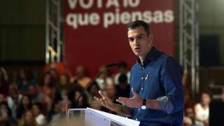 Spanish Prime Minister Pedro Sanchez takes part in a campaign rally of the Socialist Party (PSOE), in Seville on May 13, 2023, ahead of the upcoming May 28 regional and municipal election. (Photo by CRISTINA QUICLER / AFP)