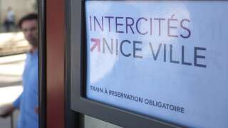 A picture taken on May 27, 2015 at Marseille Saint-Charles station, southeastern France, shows a sign on an Intercity train heading to Nice, as the intercite train linking Nice to Marseille is one of the five that should be suppressed, according to a commission examining Intercity train services, currently running on a deficit of 400 million euros. AFP PHOTO / BORIS HORVAT        (Photo credit should read BORIS HORVAT/AFP via Getty Images)