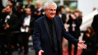 French director Claude Lelouch arrives for the screening of the film 
