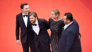 CANNES, FRANCE - MAY 19: (EDITORS NOTE : Image has been digitally retouched)  Members of the Jury Paul Dano, President of the Jury Ruben Östlund, Julia Ducournau and Denis Ménochet attend the 