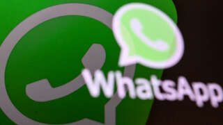 This illustration photograph taken on April 11, 2023, shows the US instant messaging software Whatsapp's logo on a smartphone screen in Moscow. (Photo by Kirill KUDRYAVTSEV / AFP)