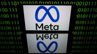 (FILES) In this file photo taken on January 12, 2023 in Toulouse, southwestern France, shows a tablet displaying the logo of the company Meta. Facebook owner Meta has been fined a record 1.2 billion euros ($1.3 billion) for transferring EU user data to the United States in breach of a previous court ruling, Ireland's regulator announced May 23, 2023. The Irish Data Protection Commission, which acts on behalf of the European Union, said the European Data Protection Board had ordered it to collect 