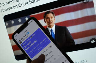 This illustration photo shows the live Twitter talk with Elon Musk with a background of Ron DeSantis as he announces his 2024 presidential run on his Twitter page, May 24, 2023 in Los Angeles, California. Republican Ron DeSantis kicked off his 2024 presidential campaign May 24, 2023 with a live event opposite Twitter boss Elon Musk that descended into farce as it was beset by technical bugs. (Photo by Chris DELMAS / AFP)