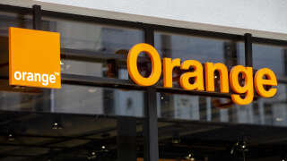 This photograph shows the logo of Orange telecommunication corporation on a store in Brussels on February 18, 2023. (Photo by NICOLAS MAETERLINCK / Belga / AFP) / Belgium OUT