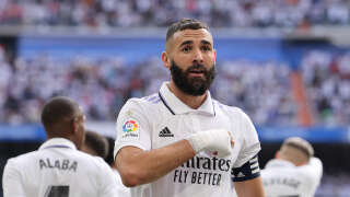 (FILES) Real Madrid's French forward Karim Benzema celebrates after scoring his team's first goal during the Spanish League football match between Real Madrid CF and FC Barcelona at the Santiago Bernabeu stadium in Madrid on October 16, 2022. French forward Karim Benzema will leave Real Madrid at the end of this season, the club announced on June 4, 2023. (Photo by THOMAS COEX / AFP)