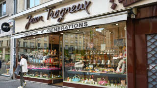 A picture shows a chocolate shop owned by French First Lady Brigitte Macron's grandnephew Jean-Baptiste Trogneux who was attacked a day before by anti-government protesters, in Amiens on May 16, 2023. The great-nephew of French First Lady Brigitte Macron, who runs the family's main chocolate shop, has been beaten up in an apparent politically motivated assault, police and family sources said on Tuesday. Local police said they had arrested eight people after the attack, which took place shortly after President Macron had appeared for an interview on the country's main TV news programme at 8:00 pm (1800 GMT) on Monday evening. (Photo by DENIS CHARLET / AFP)