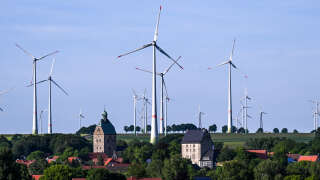 Wind turbines are pictured in Lichtenau, western Germany on May 31, 2023. (Photo by Ina FASSBENDER / AFP)