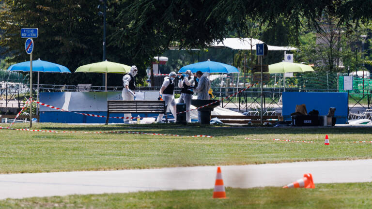 ANNECY, FRANCE - JUNE 08: Scientific police works on the crime scene in the Paquier park where a man stabbed multiple people on June 8, 2023 in Annecy, France. Four children were among the victims in a knife attack in the southeastern French town of Annecy. (Photo by Richard Bord/Getty Images)