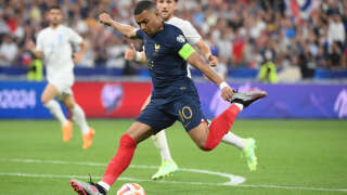 France's forward Kylian Mbappe kicks the ball during the UEFA Euro 2024 group B qualification football match between France and Greece at the Stade de France in Saint-Denis, in the northern outskirts of Paris, on June 19, 2023. (Photo by FRANCK FIFE / AFP)