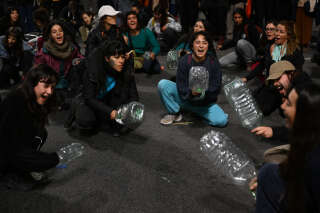 People take part in a protest called by Uruguay's Central Union (PIT-CNT) in 