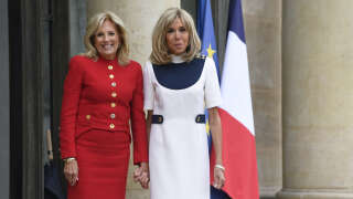 France's first lady Brigitte Macron (R) and US First Lady Jill Biden pose for photographers as they meet at the Elysee Presidential Palace in Paris, on July 25, 2023. Jill Biden arrived in France where she will take part in a ceremony celebrating the return of the United States to UNESCO after an over half decade absence. (Photo by JULIEN DE ROSA / AFP)