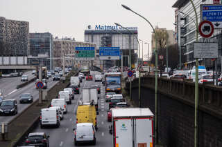 PARIS, FRANCE - MARCH 17:  General view of the Parisian Peripherique (Parisian ring road), which presents a busy traffic as people leave Paris, while the city imposes emergency measures to combat the Coronavirus COVID-19 outbreak, on March 17, 2020 in Paris, France. The Coronavirus Covid-19 epidemic has exceeded 6,500 dead for more than 169,000 infections across the world. In order to combat the Coronavirus COVID-19 outbreak, and during a televised speech dedicated to the coronavirus crisis on March 16, French President, Emmanuel Macron announced that France starts a nationwide lockdown on March 17 at noon.  (Photo by Edward Berthelot/Getty Images)