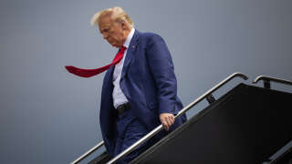 ARLINGTON, VA - AUGUST 3:  Former president Donald Trump arrives at Ronald Reagan Washington National Airport in Arlington, Va. on Thursday, August 3, 2023 before appearing at E. Barrett Prettyman United States Court House. Trump pleaded not guilty Thursday to charges that he conspired to overturn the results of the 2020 election.  (Photo by Tom Brenner for The Washington Post via Getty Images)