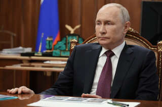 In this pool photograph distributed by Sputnik agency Russia's President Vladimir Putin looks on during a meeting with Denis Pushilin, Moscow-appointed head of the Donetsk region of Ukraine - which is controlled by Russian forces, in Moscow, on August 24, 2023. (Photo by Mikhail KLIMENTYEV / POOL / AFP)