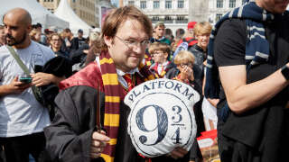 26 August 2023, Hamburg: Axel Bernhard from Argentina, music teacher, comes dressed as Harry Potter to the City Hall Market. Harry Potter celebrated the 25th anniversary with a world record attempt at the Rathausmarkt. More than 997 people dressed as Harry Potter were needed in the square to break the current record. Photo: Georg Wendt/dpa (Photo by Georg Wendt/picture alliance via Getty Images)