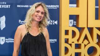 French director Katell Quilevere poses during a photocall for the film 'Le Temps d’Aimer' (Along came love) during the 16th Francophone Angouleme Film Festival in Angouleme, western France, on August 23, 2023. (Photo by YOHAN BONNET / AFP)