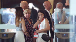 Spain's football federation president Luis Rubiales (C), his mother Angeles Bejar (L) and his father Luis Rubiales (R) leave after an extraordinary general assembly of the federation on August 25, 2023 in Las Rozas de Madrid. Rubiales' mother Angeles Bejar started a hunger strike in support to her son in the Divina Pastora church in Motril, southern Spain, on August 28, 2023, as a growing number of voices denounce the Spain's football federation president after his forced kiss on Jenni Hermoso's lips at women's World Cup final. Rubiales was provisionally suspended by FIFA for 90 days on August 26, and Spain's prosecutors opened a preliminary sex abuse probe on August 28. (Photo by Pierre-Philippe MARCOU / AFP)