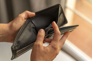 Woman hands opening an empty wallet