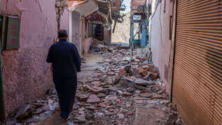 Rubble from damaged buildings cover a street in Moulay Brahim, Morocco, on Monday, Sept. 11, 2023. Morocco's government pledged to help survivors of the earthquake on Friday that killed more than 2,800 people, including financial assistance for the reconstruction of homes and schools. Photographer: Nathan Laine/Bloomberg via Getty Images