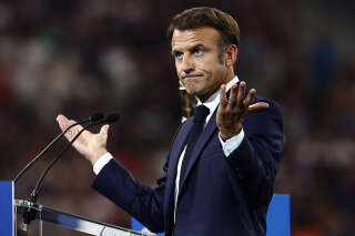 French President Emmanuel Macron delivers a speech during the opening ceremony of the France 2023 Rugby World Cup ahead of the Pool A match between France and New Zealand at the Stade de France in Saint-Denis, on the outskirts of Paris on September 8, 2023. (Photo by Anne-Christine POUJOULAT / AFP)