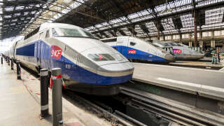 Paris, France - July 12, 2013: High speed TGV trains parked at the Gare de Lyon train station platform.