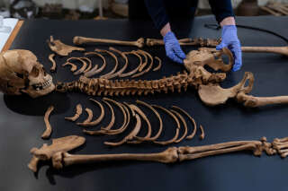 Remains of the woman found at the 17th century cemetery for rejected people in the village of Pien, northern Poland, are revealed by Polish archaeologists from Nicolas Copernicus University in Torun, Poland October 27, 2023. The woman's body was found with a padlock on her leg and a sickle around the neck which suggest the person was believed to be a 'vampire' and was secured to the ground to avoid 'her rising from the grave'. REUTERS/Lukasz Glowala