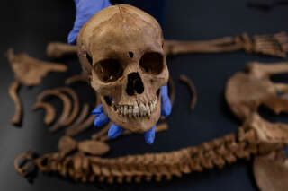 Remains of the woman found at the 17th century cemetery for rejected people in the village of Pien, northern Poland, revealed by Polish archaeologists from Nicolas Copernicus University in Torun, Poland, October 27, 2023. The woman's body was found with a padlock on her leg and a sickle around the neck which suggest the person was believed to be a 'vampire' and was secured to the ground to avoid 'her rising from the grave'. REUTERS/Lukasz Glowala