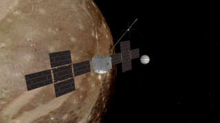 Illustration of the Goss probe flying over Ganymede, one of Jupiter's moons.