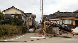 Des bâtiments gravement endommagés, près d’Ishikawa, le 1er janvier 2024, après qu’un important tremblement de terre de magnitude 7,5 a frappé la région de Noto.
