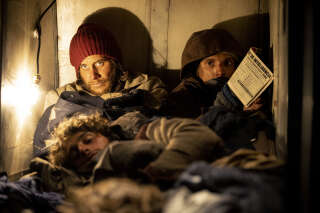 Agustín Pardella (with the red cap) plays Nando in “The Snow Circle.”