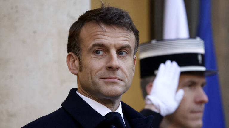 France's President Emmanuel Macron looks on as he awaits the arrival of officials at the Elysee presidential palace in Paris, on February 26, 2024, to take part in an international conference aimed at strengthening Western support for Ukraine. The meeting at the Elysee Palace will be a chance for participants to 