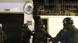 Ecuadorian police attempt to enter the Mexican embassy in Quito on April 5, 2024.