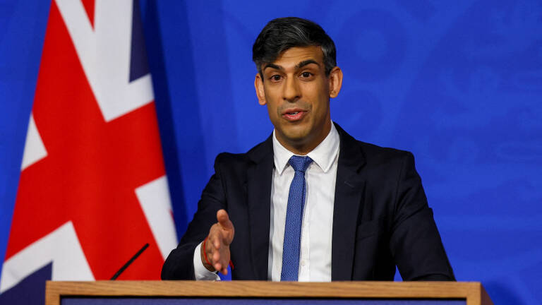 Britain's Prime Minister Rishi Sunak speaks during a press conference, at the Downing Street Briefing Room, in central London, on April 22, 2024 regarding the Britain and Rwanda treaty to transfer illegal migrants to the African country. Rishi Sunak promised on April 22, 2024 that deportation flights of asylum seekers to Rwanda will begin in "10 to 12 weeks", as the plan entered its final stage in parliament. (Photo by Toby Melville / POOL / AFP)