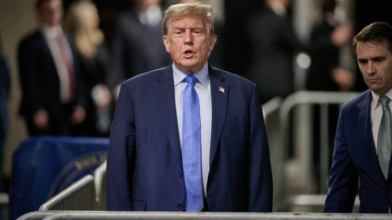 NEW YORK, NEW YORK - APRIL 26: Former U.S. President Donald Trump speaks to the media at the end of the day during his trial for allegedly covering up hush money payments at Manhattan Criminal Court on April 26, 2024 in New York City. Former U.S. President Donald Trump faces 34 felony counts of falsifying business records in the first of his criminal cases to go to trial.   Curtis Means-Pool/Getty Images/AFP (Photo by POOL / GETTY IMAGES NORTH AMERICA / Getty Images via AFP)