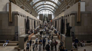 People visit The Orsay Museum in Paris, on August 30, 2023. (Photo by MIGUEL MEDINA / AFP)