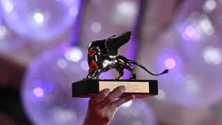 US director Laura Poitras holds the Golden Lion for Best Film she reveived for 