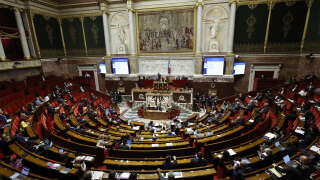 Frenc MPs attend a debate on the constitutional bill aimed at enlarging the electorate of the overseas French territory of New Caledonia, at the French National Assembly in Paris, on May 14, 2024. Riots erupted on May 13, 2024 in New Caledonia's main city Noumea over a constitutional reform that is being debated in the French National Assembly in Paris, and which aims to expand the electorate for the archipelago's provincial elections, a reform that is a source of local tension between loyalists and independentists, on May 14, 2024. (Photo by Geoffroy VAN DER HASSELT / AFP)