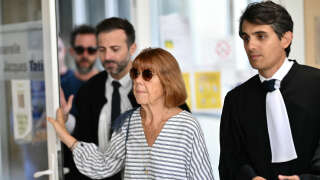 Gisele Pelicot, flanked by her lawyer Stephane Babonneau (R), arrives to attend a session of the trial of her former partner Dominique Pelicot accused of drugging her for nearly ten years and inviting strangers to rape her at their home in Mazan, a small town in the south of France, in Avignon, on September 10, 2024. A court in the southern town of Avignon is trying Dominique Pelicot, a 71-year-old retiree, for repeatedly raping and enlisting dozens of strangers to rape his heavily sedated wife in her own bed over a decade. Fifty other men, aged between 26 and 74, are also on trial for alleged involvement, in a case that has horrified France. The court proceedings, which runs until December, are open to the public at the request of Dominique Pelicot's ex-wife and victim. (Photo by Christophe SIMON / AFP)