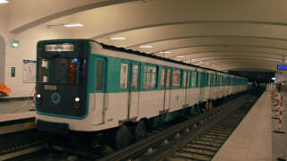 This photograph taken during a visit with agents of RATP in Rosny-sous-Bois, east of Paris, on May 28, 2024, shows a train passes in the new metro station of line 11, which will be officially extended on June 13 to Rosny-Bois-Perrier, a few meters away from the RER train station of line E of the same name Rosny-Bois-Perrier. (Photo by Sami KARAALI / AFP)